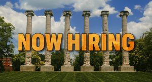 Now Hiring words in front of the MU Columns